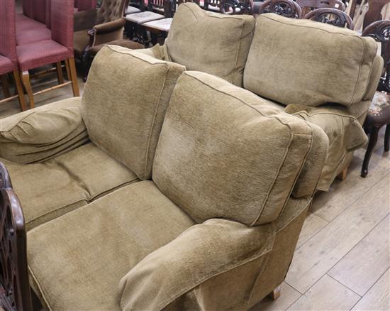 Two modern two seater settees and a large footstool